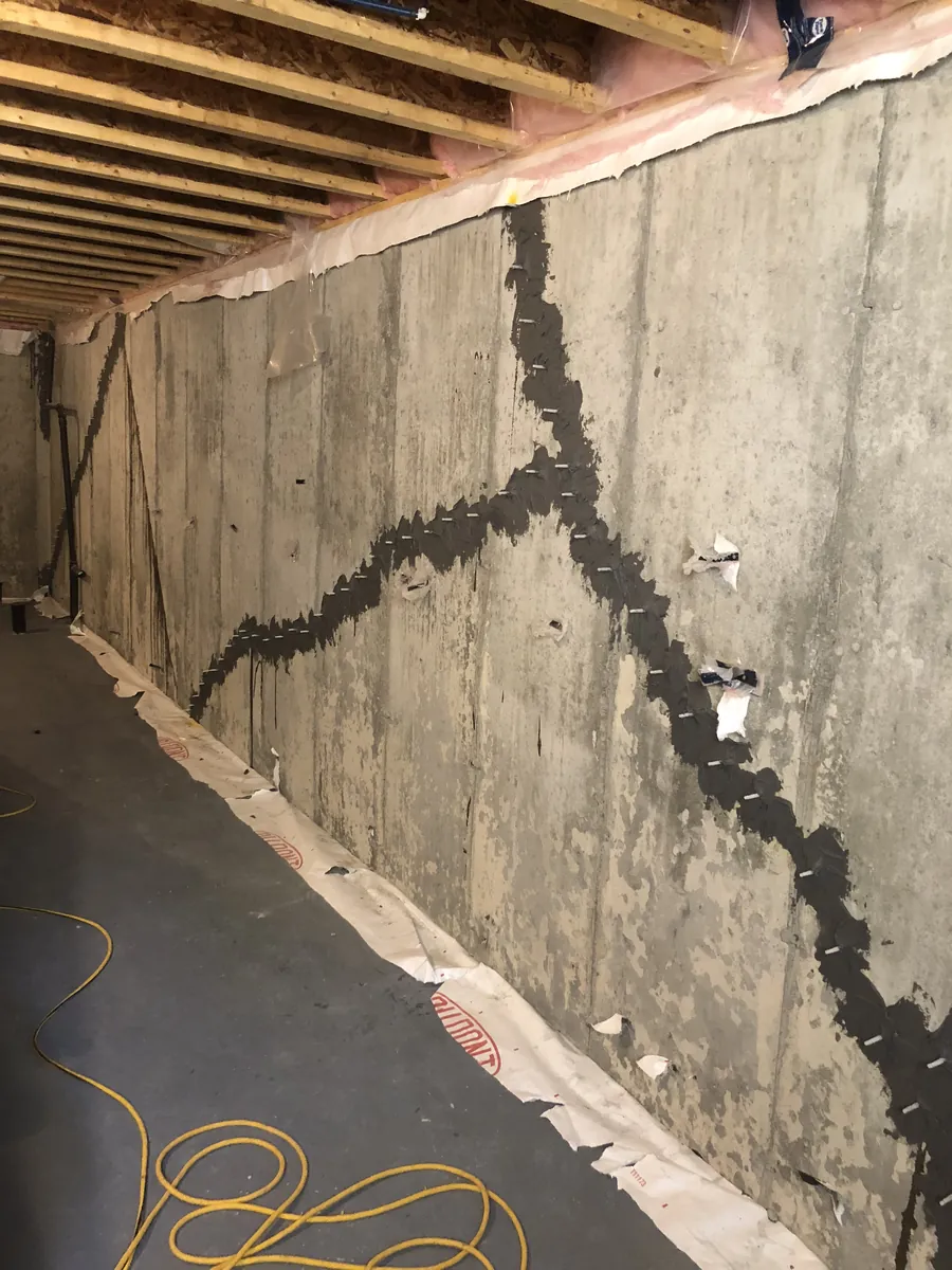 Full-height foundation crack sealed floor to ceiling with polyurethane injection in a GTA basement